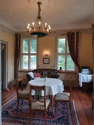 Ein Sitzbereich in der Unterkunft Herrenhaus Orangella
