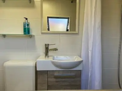 Ein Badezimmer in der Unterkunft Mobilheim Wiesenblick