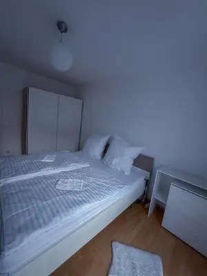 Ein Bett oder Betten in einem Zimmer der Unterkunft Wohnung in der Südvorstadt