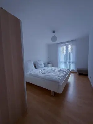 Ein Bett oder Betten in einem Zimmer der Unterkunft Wohnung in der Südvorstadt