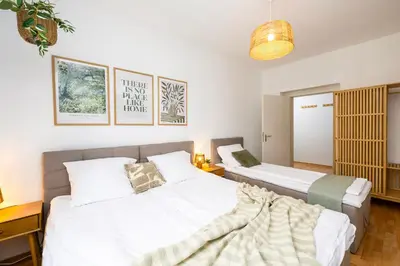 Ein Bett oder Betten in einem Zimmer der Unterkunft Staytime - Urban One I Center I Top Anbindung