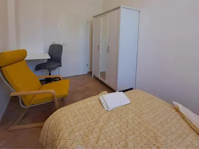 Ein Bett oder Betten in einem Zimmer der Unterkunft Ferienwohnungen Mühlenstraße Chemnitz - zentrumsnah, Parkplatz inklusive - ideal für Familien, Paare und Geschäftsleute