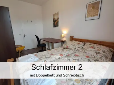 Ein Bett oder Betten in einem Zimmer der Unterkunft Ferienwohnungen Mühlenstraße Chemnitz - zentrumsnah, Parkplatz inklusive - ideal für Familien, Paare und Geschäftsleute