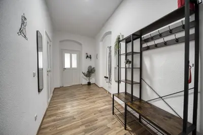 Ein Bett oder Betten in einem Zimmer der Unterkunft DresdenStay Blasewitz 3 Schlafzimmer Kamin PS4