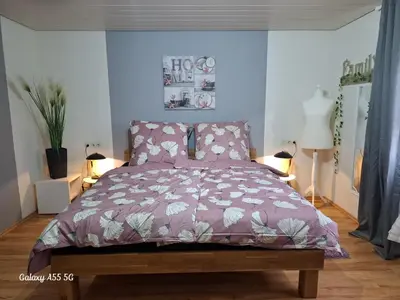 Ein Bett oder Betten in einem Zimmer der Unterkunft Ferienwohnung seeblick