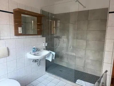 Ein Badezimmer in der Unterkunft Eutschützer Mühle