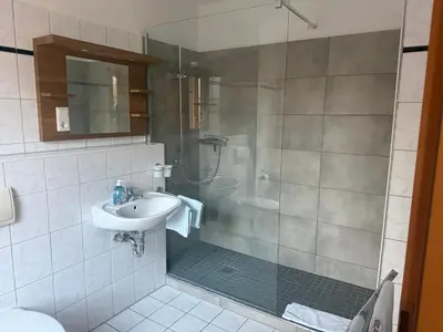Ein Badezimmer in der Unterkunft Eutschützer Mühle