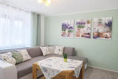 Ein Sitzbereich in der Unterkunft Ferienwohnung Saupe