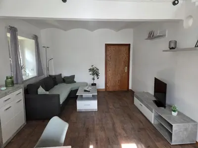 Ein Sitzbereich in der Unterkunft Ferienwohnung in Hilmersdorf