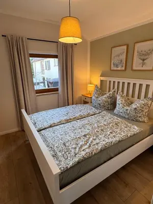 Ein Bett oder Betten in einem Zimmer der Unterkunft Ferienhaus am Panoramaweg Sächsische Schweiz
