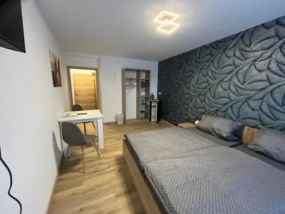 Ein Bett oder Betten in einem Zimmer der Unterkunft Apartment Zum Schlosspark Lauchhammer