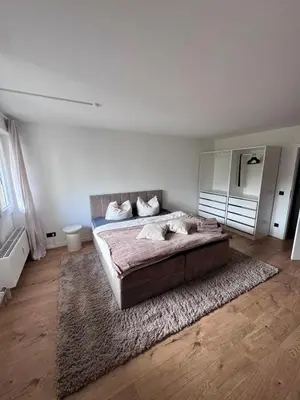 Ein Bett oder Betten in einem Zimmer der Unterkunft Modernes City-Studio mit Balkon & Top Ausstattung