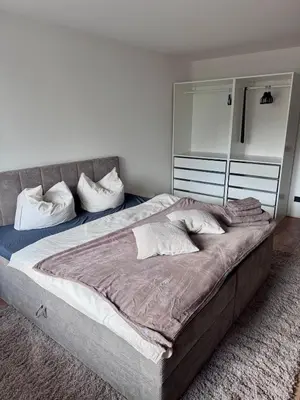 Ein Bett oder Betten in einem Zimmer der Unterkunft Modernes City-Studio mit Balkon & Top Ausstattung