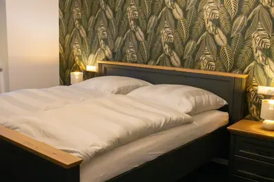 Ein Bett oder Betten in einem Zimmer der Unterkunft Ferienappartment Sickert