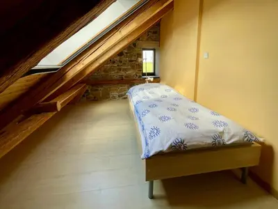 Ein Bett oder Betten in einem Zimmer der Unterkunft Alte Scheune Rietzschelhof mit Pool
