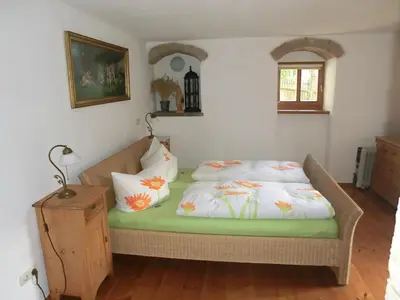 Ein Bett oder Betten in einem Zimmer der Unterkunft Ferienwohnung mit Charme in Dresden Pillnitz