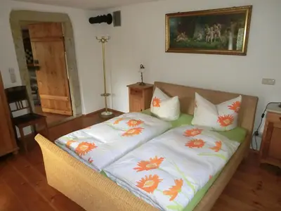 Ein Bett oder Betten in einem Zimmer der Unterkunft Ferienwohnung mit Charme in Dresden Pillnitz