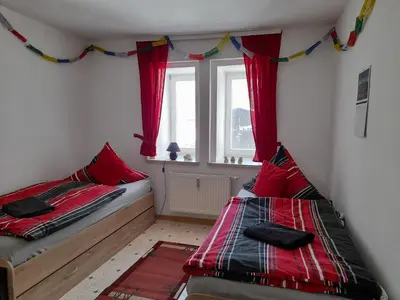 Ein Bett oder Betten in einem Zimmer der Unterkunft Sapana