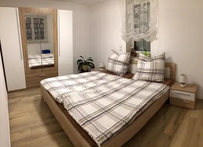 Ein Bett oder Betten in einem Zimmer der Unterkunft Erzgebirgsferien