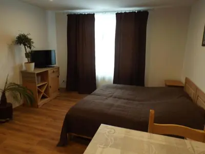 Ein Bett oder Betten in einem Zimmer der Unterkunft Ferienwohnung Gittersee