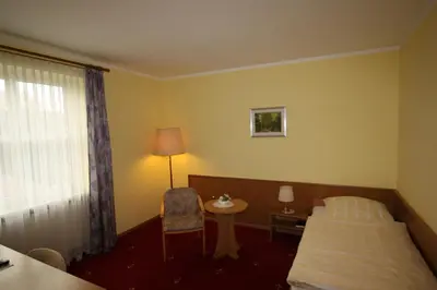 Ein Bett oder Betten in einem Zimmer der Unterkunft Hotel Bürgerhof