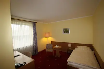 Ein Bett oder Betten in einem Zimmer der Unterkunft Hotel Bürgerhof