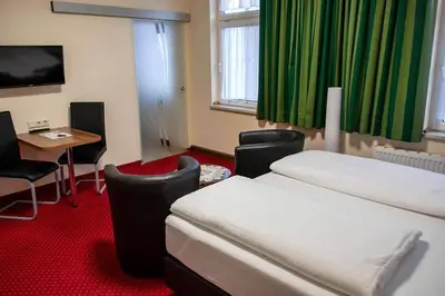 Ein Bett oder Betten in einem Zimmer der Unterkunft Pension Wehner