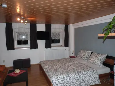 Ein Bett oder Betten in einem Zimmer der Unterkunft Ferienwohnung-Kubis