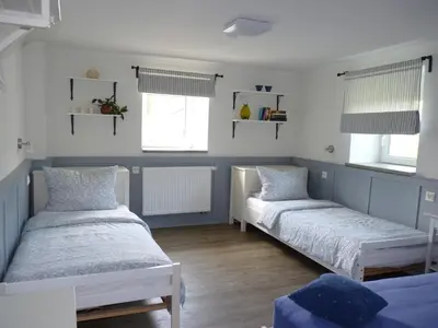 Ein Bett oder Betten in einem Zimmer der Unterkunft Ferienwohnung-Kubis