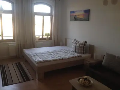 Ein Bett oder Betten in einem Zimmer der Unterkunft Apartment Naumann