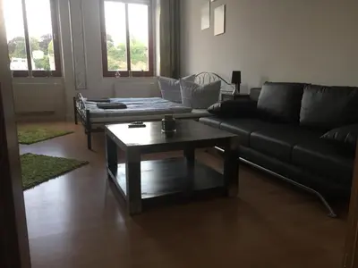 Ein Sitzbereich in der Unterkunft Apartment Naumann