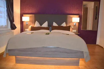 Ein Bett oder Betten in einem Zimmer der Unterkunft Pension Lachmann
