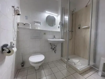 Ein Badezimmer in der Unterkunft Altstadthotel 