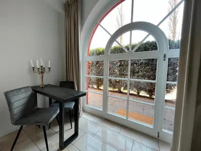 Ein Balkon oder eine Terrasse in der Unterkunft Villa am Park Apartment