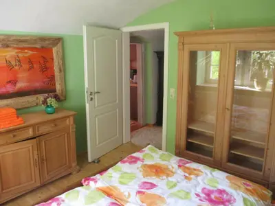 Ein Bett oder Betten in einem Zimmer der Unterkunft Stadtoase