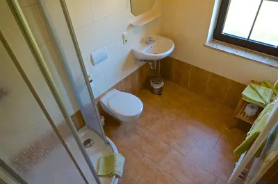 Ein Badezimmer in der Unterkunft Gasthaus Rundteil
