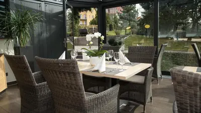 Ein Sitzbereich in der Unterkunft Hotel Maucksches Gut