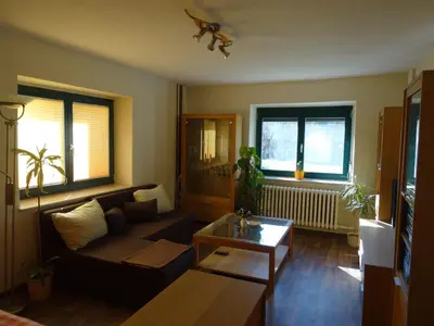Ein Sitzbereich in der Unterkunft Apartment Zum Keulenbergblick