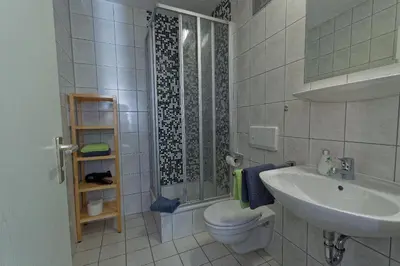 Ein Badezimmer in der Unterkunft Pension Am Kirschberg