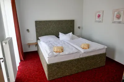 Ein Bett oder Betten in einem Zimmer der Unterkunft Ferienhof Radlerslust