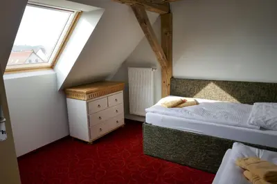 Ein Bett oder Betten in einem Zimmer der Unterkunft Ferienhof Radlerslust