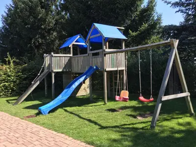 Ein Kinderspielbereich in der Unterkunft Ferienhof Radlerslust