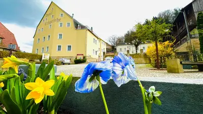 Ein Garten an der Unterkunft Apartments Erbgericht