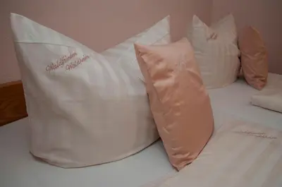 Ein Bett oder Betten in einem Zimmer der Unterkunft Waldfrieden Waldheim