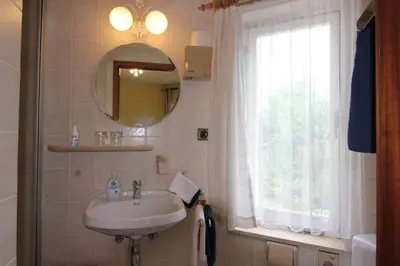 Ein Badezimmer in der Unterkunft W.I.P. Welt im Park