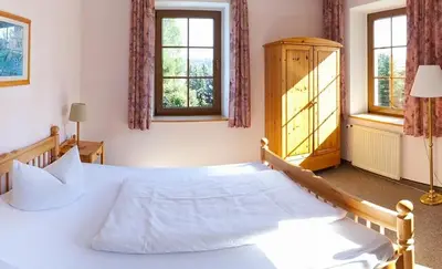 Ein Bett oder Betten in einem Zimmer der Unterkunft Hotel & Restaurant Kleinolbersdorf