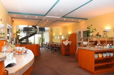 Ein Restaurant oder anderes Speiselokal in der Unterkunft Hotel Moritz an der Elbe