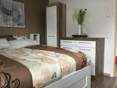 Ein Bett oder Betten in einem Zimmer der Unterkunft Ferienwohnung Schusi Freital