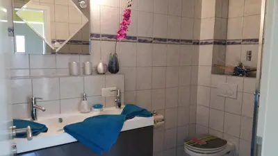Ein Badezimmer in der Unterkunft Ferienwohnung Schusi Freital