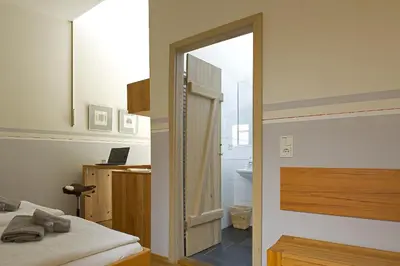Ein Bett oder Betten in einem Zimmer der Unterkunft Alte Remise